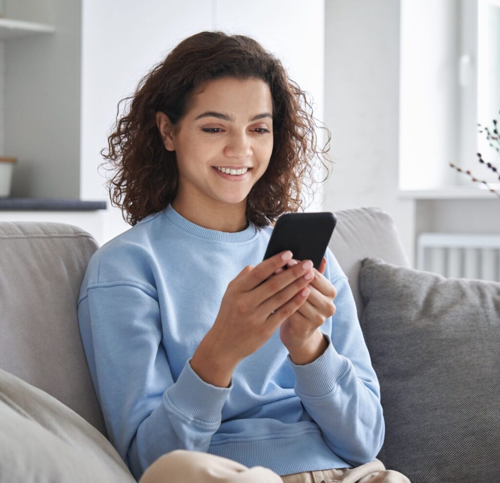 A customer paying her online bills using Alacriti electronic bill payment services